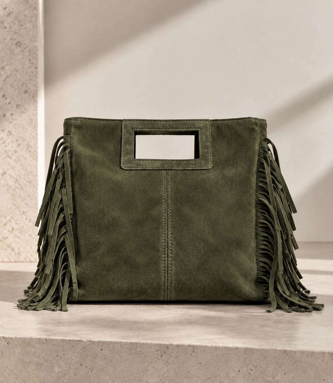 Bolso de piel serraje con flecos
