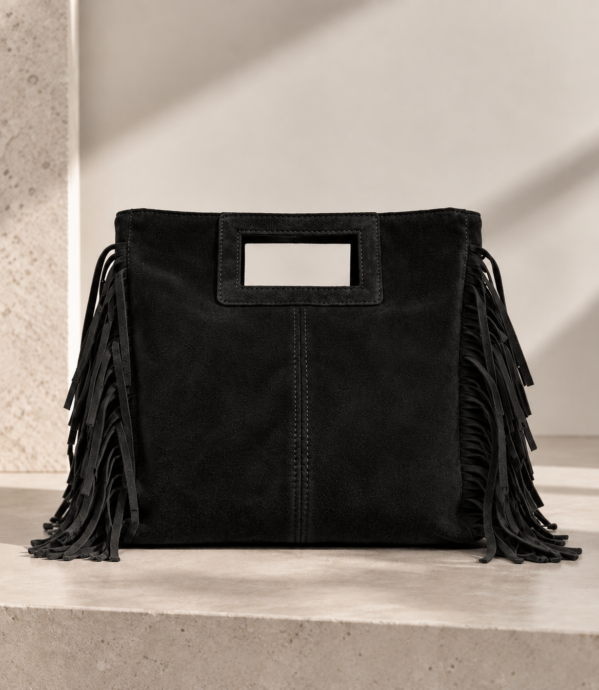 Bolso de piel serraje con flecos
