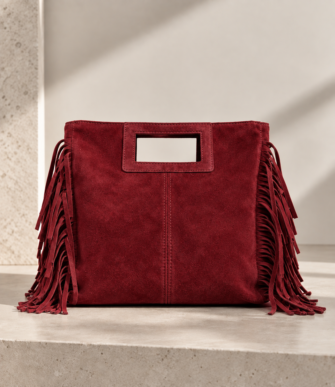 Bolso de piel serraje con flecos