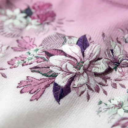 Aurora | SUÉTER CON CUELLO ALTO Y ESTAMPADO FLORAL
